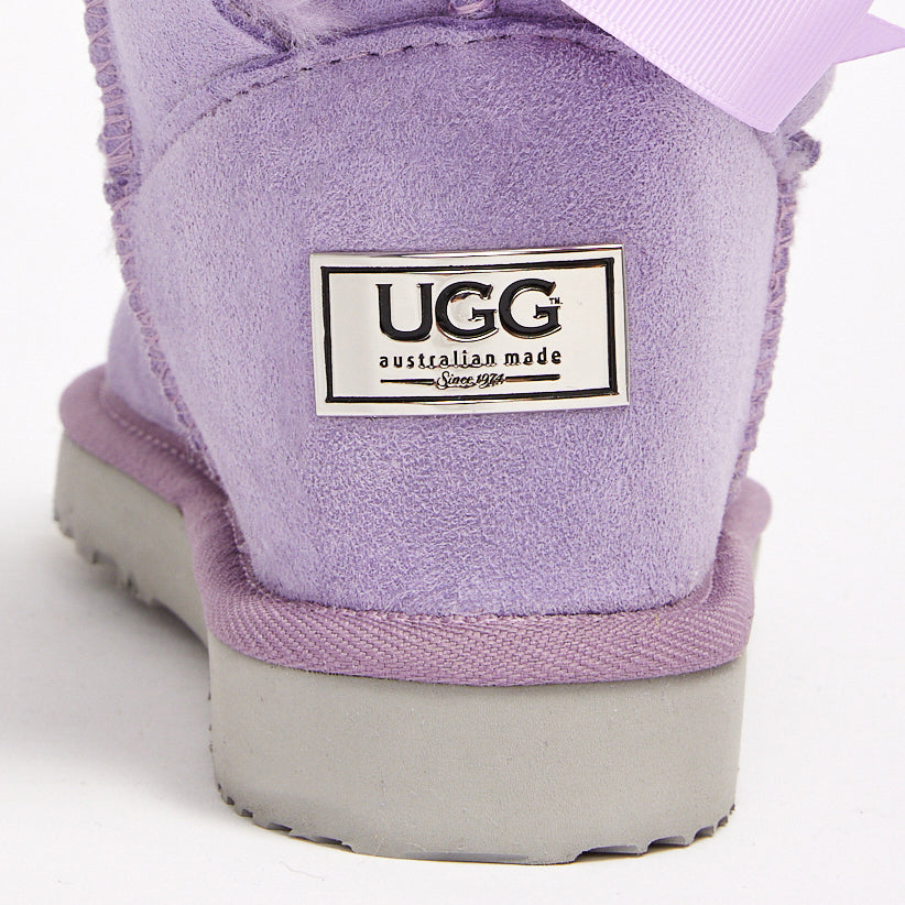 Ugg boots with metal label on heel online