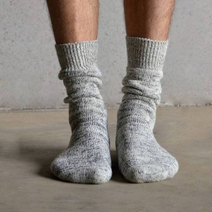 Favorite wool socks had worn super thin in the heels...several hours and a  friend's lightweight wool yarn, and they're back in business! :  r/Visiblemending