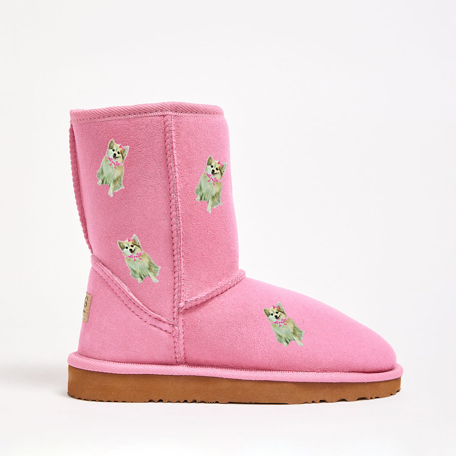 Pink ugg boots shop with pom poms